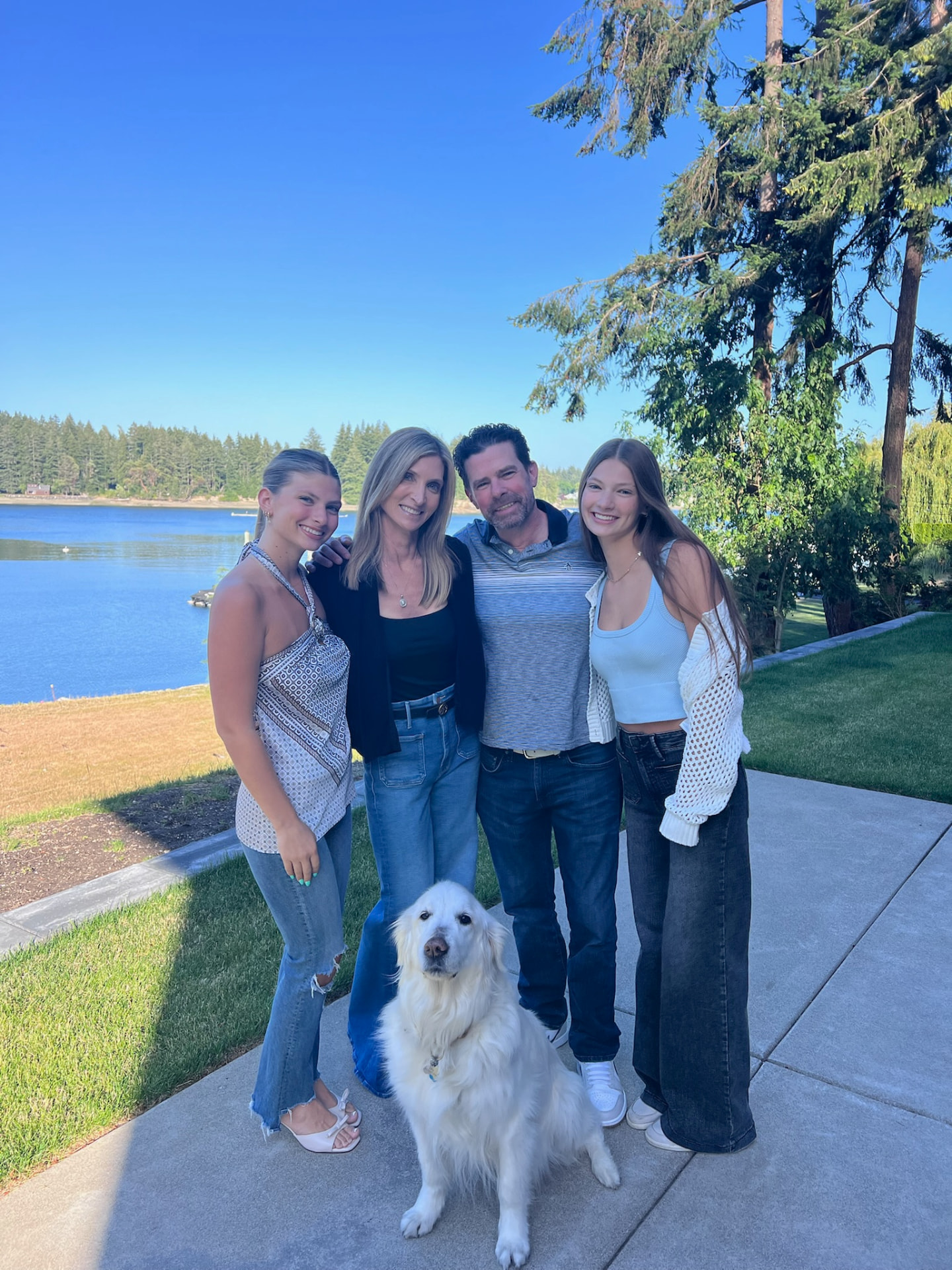 Madison with her family and Lily on Fox Island